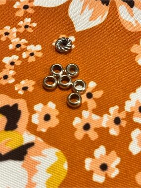 Silver Spacer Beads: 7 in total